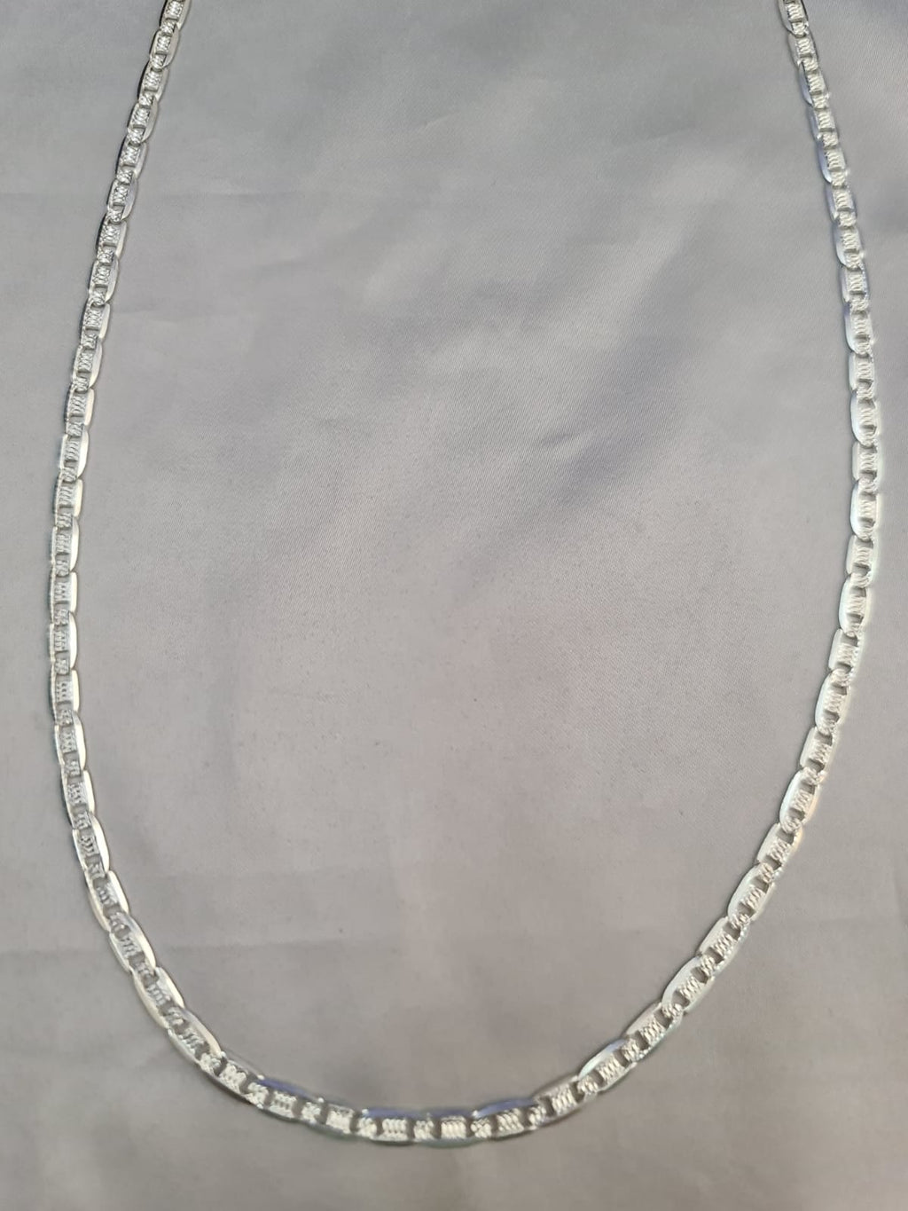 Eslabón Gucci diamantado
