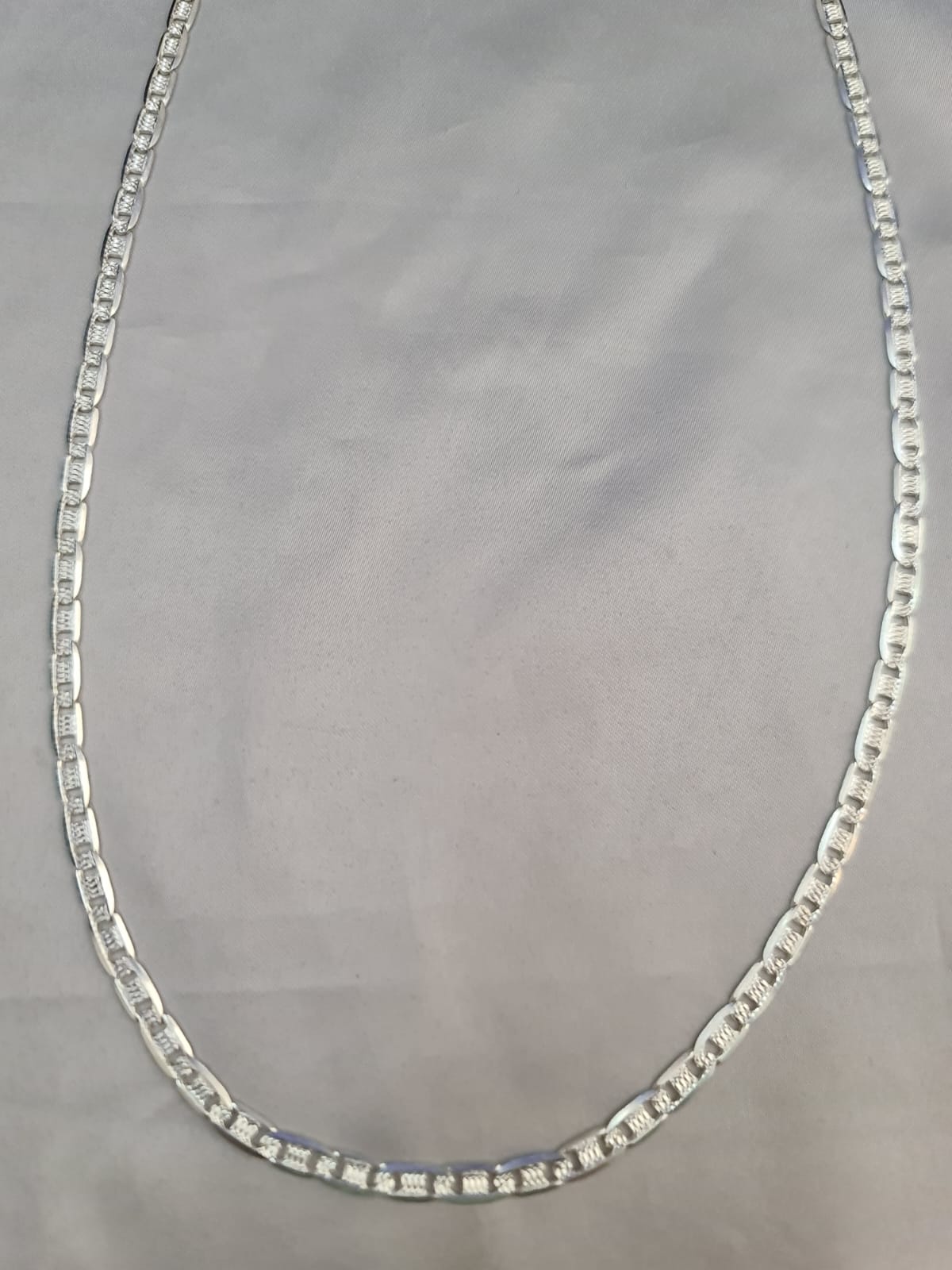 Eslabón Gucci diamantado