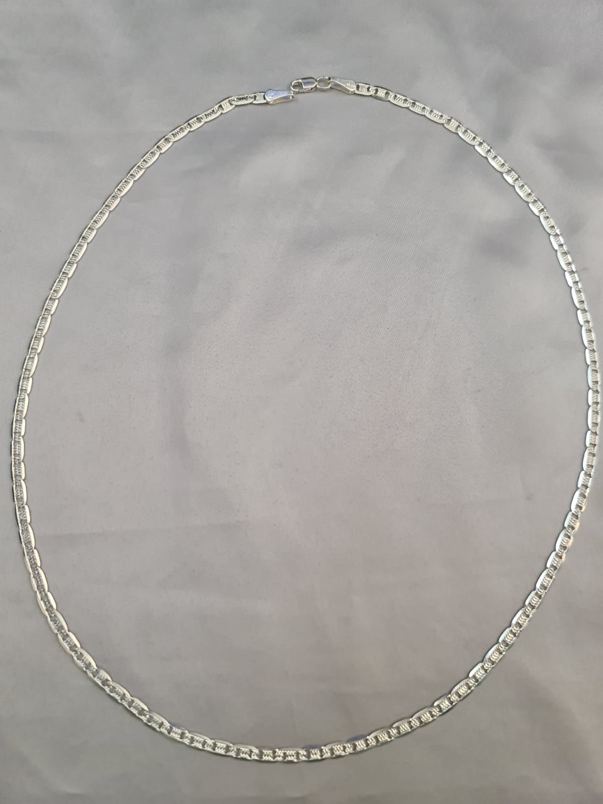 Eslabón Gucci diamantado